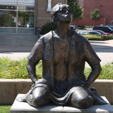 Bronze sculpture of a woman by Tom Ware