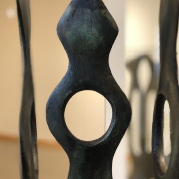 view through a hole in a bronze sculpture by Neil Goodman