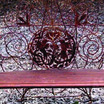 detail of a steel and wood bench by Kristine Smock