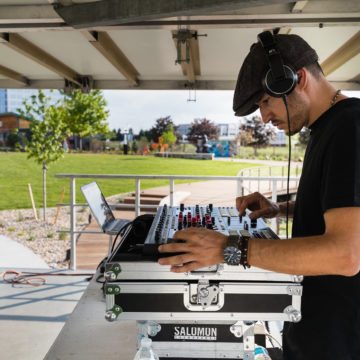 DJ Manos playing music at Marjorie Park