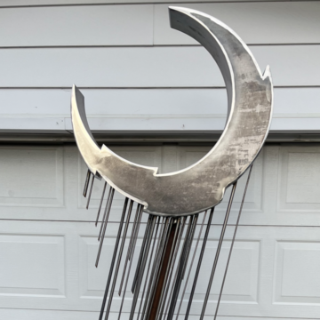 Crescent mood sculpture made of stainless steel by AJ Davis